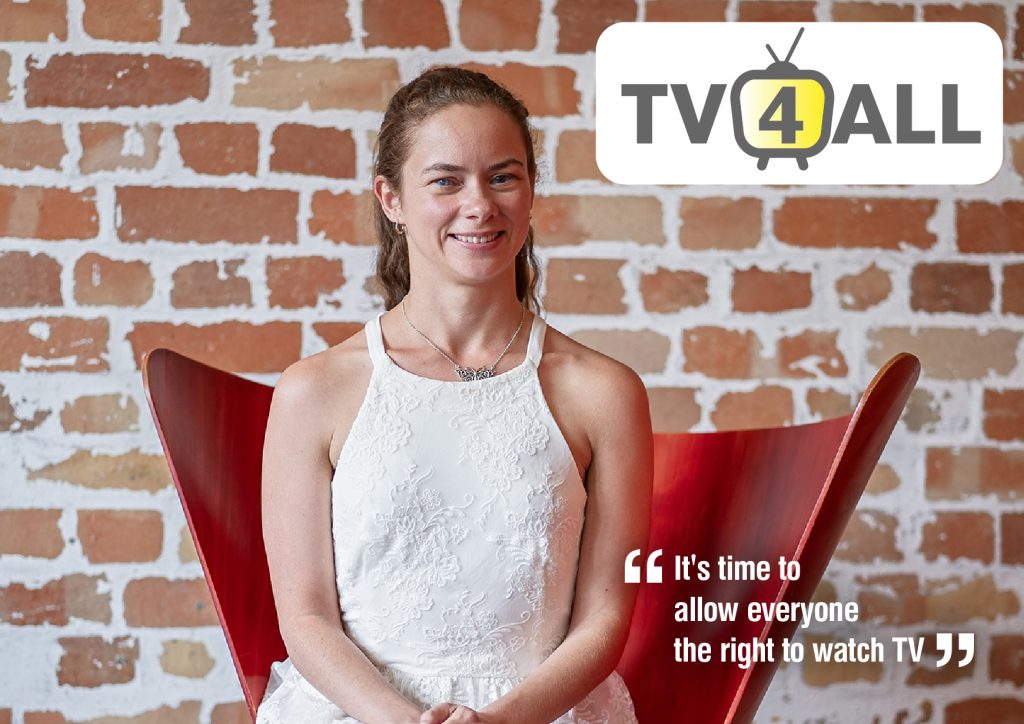 Image of a young woman wearing white seated in front of a brick wall, text reads "TV 4 All, it's time to allow everyone the right to watch TV"